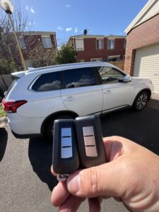 2018 Mitsubishi Outlander, smart key, Taylors Lakes — car key replaced on site by Budget Auto Keys