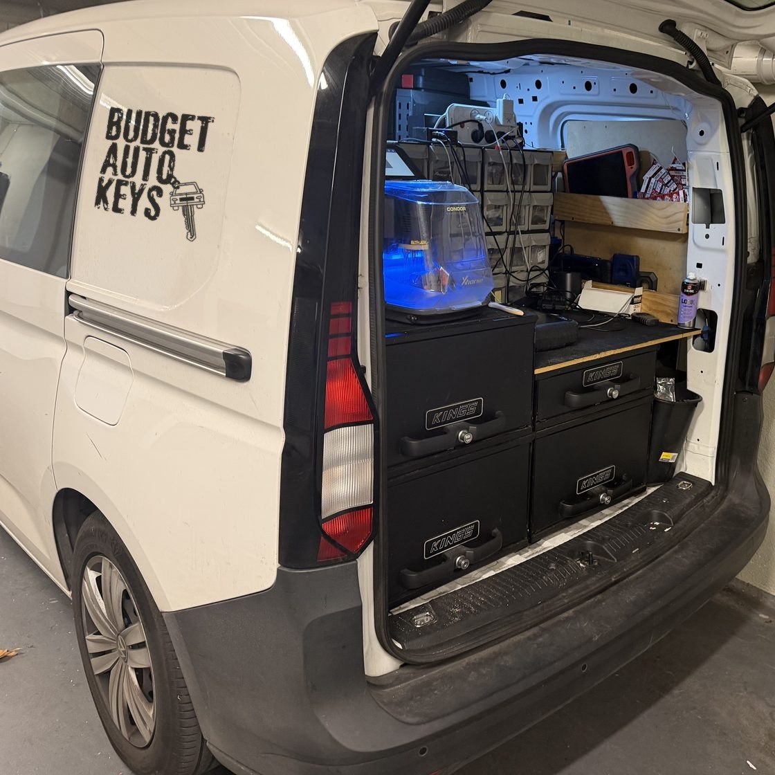 The Budget Auto Keys van with the key cutting machine and locksmith gear inside